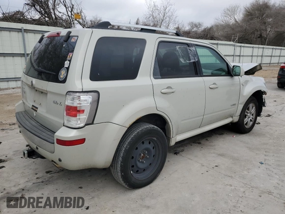 2008 Mercury Mariner Premier z VIN 4M2CU97188KJ41798, wystawiony jako Copart lot #43960565 z przebiegiem 154 302 mil mil oraz Szkody całkowita. Historia ofert i sprzedaży dostępna na DreamBid. Obrazek 3.
