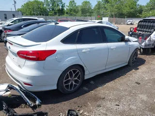2016 Ford Focus SE with VIN 1FADP3F27GL385739, listed as a IAAI auction lot 42400329 with 114,331 mi miles and . Bid and sale history available at DreamBid. Image 4.
