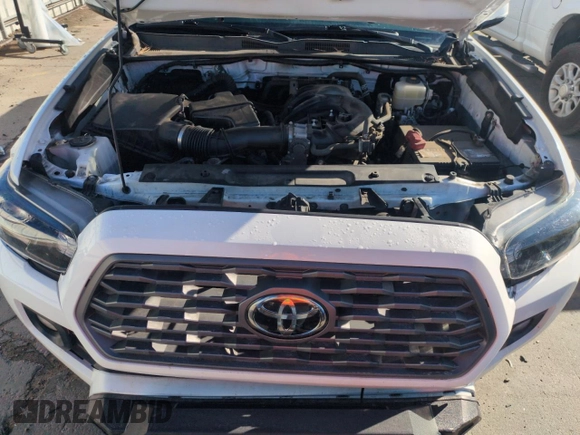 2020 Toyota Tacoma SR5 z VIN 5TFCZ5AN9LX230688, wystawiony jako Copart lot #55305165 z przebiegiem 50 381 mil mil oraz Szkoda całkowita • Salvage title. Historia ofert i sprzedaży dostępna na DreamBid. Obrazek 11.