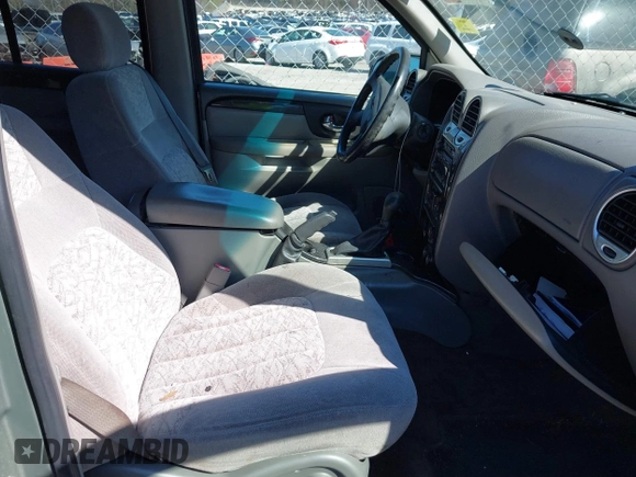 2003 GMC Envoy SLT with VIN 1GKDS13S432373988, listed as a IAAI auction lot 41840744 with 221,306 mi miles. Bid and sale history available at carsss.com. Image 5.
