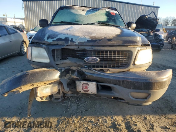 2000 Ford Expedition XLT with VIN 1FMRU1668YLA68761, listed as a Copart auction lot 88716735 with Not Provided miles and Salvage Title. Bid and sale history available at DreamBid. Image 5.