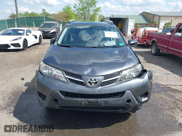 2015 Toyota RAV4 LE with VIN JTMBFREV2FD104409, listed as a IAAI auction lot 42084145 with 102,948 mi miles and . Bid and sale history available at DreamBid. Image 12.