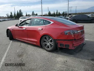 2020 Tesla Model S Long Range with VIN 5YJSA1E22LF401139, listed as a Copart auction lot 44770285 with 128,685 mi miles and Salvage title. Bid and sale history available at DreamBid. Image 2.