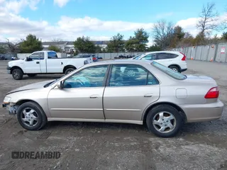 2000 Honda Accord EX z VIN 1HGCG6672YA069215, wystawiony jako IAAI lot #41508330 z przebiegiem 138 721 mil mil oraz . Historia ofert i sprzedaży dostępna na DreamBid. Obrazek 14.