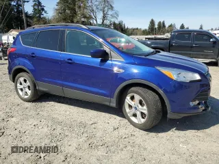 2015 Ford Escape SE with VIN 1FMCU9G91FUB81973, listed as a Copart auction lot 52988325 with 99,000 mi miles and Salvage Title. Bid and sale history available at carsss.com. Image 4.