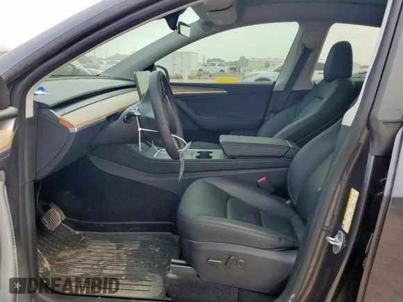 2024 Tesla Model Y Long Range with VIN 7SAYGDEE2RA287446, listed as a Copart auction lot 57640895 with 27,932 mi miles and Salvage title. Bid and sale history available at DreamBid. Image 7.