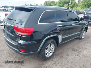 2011 Jeep Grand Cherokee Limited with VIN 1J4RR5GG1BC581520, listed as a IAAI auction lot 41916395 with 151,613 mi miles. Bid and sale history available at carsss.com. Image 4.