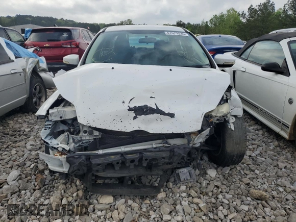 2013 Ford Focus SE z VIN 1FADP3F24DL217259, wystawiony jako Copart lot #51573535 z przebiegiem Nie podano mil oraz Szkoda całkowita • Salvage title. Historia ofert i sprzedaży dostępna na DreamBid. Obrazek 5.