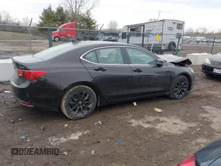 2015 Acura TLX with VIN 19UUB1F35FA022700, listed as a IAAI auction lot 41610750 with 157,500 mi miles. Bid and sale history available at carsss.com. Image 13.