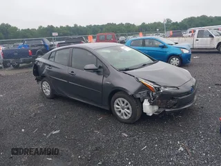 2019 Toyota Prius L Eco with VIN JTDKARFU8K3093579, listed as a IAAI auction lot 42502932 with 60,558 mi miles and . Bid and sale history available at DreamBid. Image 1.