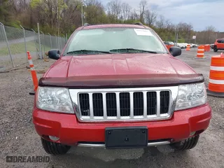2004 Jeep Grand Cherokee Limited with VIN 1J4GW58S94C299311, listed as a IAAI auction lot 41912467 with 55,736 mi miles. Bid and sale history available at carsss.com. Image 12.