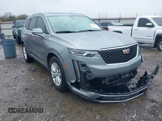 2023 Cadillac XT6 FWD Luxury with VIN 1GYKPAR42PZ231126, listed as a IAAI auction lot 41959366 with 16,156 mi miles and . Bid and sale history available at DreamBid. Image 1.