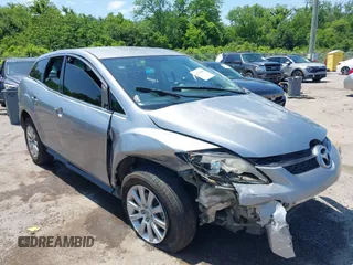 2011 Mazda CX-7 i Sport z VIN JM3ER2B55B0389115, wystawiony jako IAAI lot #42178894 z przebiegiem 237 552 mil mil oraz . Historia ofert i sprzedaży dostępna na DreamBid. Obrazek 1.