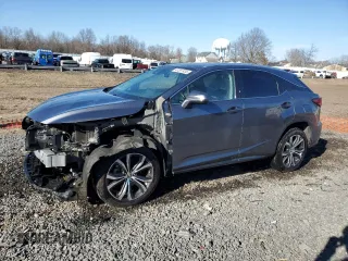 2021 Lexus RX with VIN 2T2HZMDA5MC293551, listed as a Copart auction lot 47297435 with 114,007 mi miles and Salvage Title. Bid and sale history available at carsss.com. Image 1.