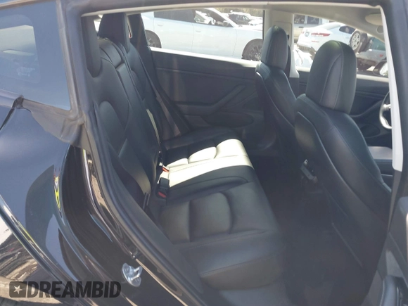 2019 Tesla Model 3 Mid Range z VIN 5YJ3E1EA5KF306816, wystawiony jako IAAI lot #41710916 z przebiegiem 76 222 mil mil oraz . Historia ofert i sprzedaży dostępna na DreamBid. Obrazek 8.