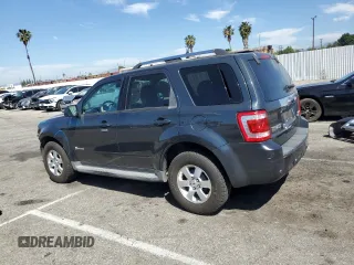 2009 Ford Escape Hybrid with VIN 1FMCU493X9KB03901, listed as a Copart auction lot 52353675 with 145,444 mi miles and Salvage title. Bid and sale history available at DreamBid. Image 2.