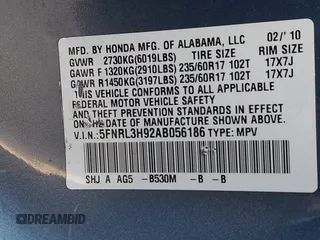 2010 Honda Odyssey Touring with VIN 5FNRL3H92AB056186, listed as a IAAI auction lot 41851386 with 199,109 mi miles. Bid and sale history available at carsss.com. Image 9.