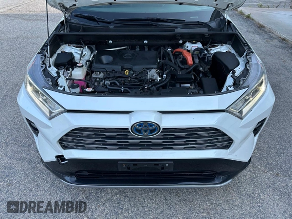 2019 Toyota RAV4 Hybrid XSE with VIN JTMEWRFV5KJ004893, listed as a Copart auction lot 65469735 with 168,511 mi miles and Clean title. Bid and sale history available at DreamBid. Image 7.