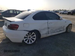 2010 BMW 1 Series 128i with VIN WBAUP9C54AVL89039, listed as a Copart auction lot 50907955 with 135,655 mi miles and Salvage Title. Bid and sale history available at DreamBid. Image 3.