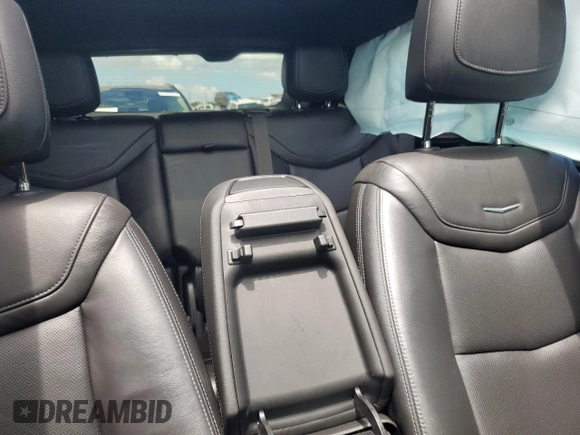 2021 Cadillac XT5 FWD Premium Luxury z VIN 1GYKNCR44MZ106982, wystawiony jako Copart lot #62234455 z przebiegiem 93 079 mil mil oraz Szkoda całkowita • Salvage title. Historia ofert i sprzedaży dostępna na DreamBid. Obrazek 10.