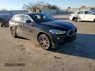 2020 BMW X2 sDrive28i with VIN WBXYH9C09L5P36280, listed as a Copart auction lot 69008942 with 57,925 mi miles. Bid and sale history available at carsss.com. Image 11.