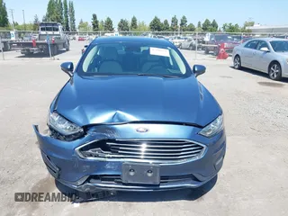 2019 Ford Fusion SE with VIN 3FA6P0HD6KR177660, listed as a IAAI auction lot 42164831 with 66,585 mi miles and . Bid and sale history available at DreamBid. Image 6.