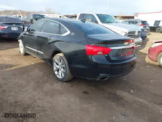 2015 Chevrolet Impala LTZ with VIN 1G1165S38FU118699, listed as a IAAI auction lot 41738530 with 124,824 mi miles. Bid and sale history available at carsss.com. Image 3.