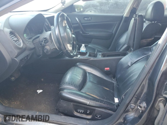 2010 Nissan Maxima SV with VIN 1N4AA5AP9AC804281, listed as a Copart auction lot 56912815 with 257,381 mi miles and Salvage title. Bid and sale history available at DreamBid. Image 7.
