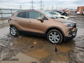 2017 Buick Encore Premium with VIN KL4CJDSB0HB121878, listed as a Copart auction lot 46696375 with 0 mi miles and Salvage Title. Bid and sale history available at carsss.com. Image 4.