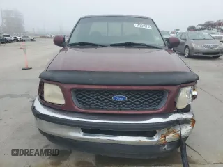 1997 Ford F-150 with VIN 2FTDX1726VCA74811, listed as a Copart auction lot 81909844 with 136,520 mi miles and Salvage title. Bid and sale history available at DreamBid. Image 5.
