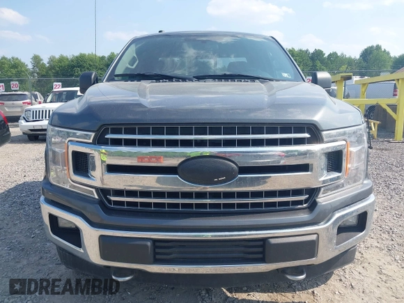 2018 Ford F-150 XL with VIN 1FTFX1E58JFD92806, listed as a IAAI auction lot 42424589 with 144,476 mi miles and . Bid and sale history available at DreamBid. Image 12.