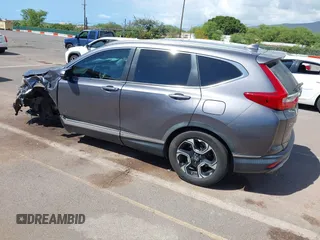 2018 Honda CR-V Touring with VIN 7FARW1H90JE030766, listed as a IAAI auction lot 41637900 with Not Provided miles and . Bid and sale history available at DreamBid. Image 3.