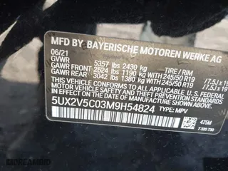 2021 BMW X4 M40i with VIN 5UX2V5C03M9H54824, listed as a IAAI auction lot 41817714 with 34,880 mi miles. Bid and sale history available at carsss.com. Image 9.