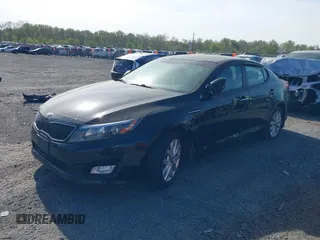 2015 Kia Optima LX with VIN KNAGM4A71F5630673, listed as a IAAI auction lot 42106584 with 245,005 mi miles and . Bid and sale history available at carsss.com. Image 2.
