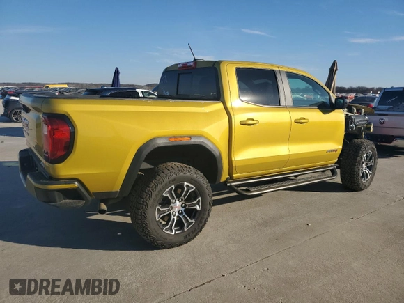2023 GMC Canyon 4WD AT4 with VIN 1GTP6DEKXP1143203, listed as a Copart auction lot 88508335 with 13,887 mi miles and Salvage Title. Bid and sale history available at carsss.com. Image 3.