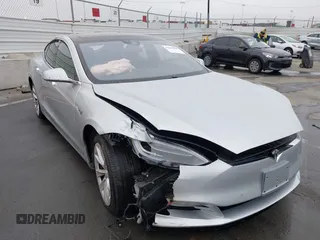 2016 Tesla Model S 70 with VIN 5YJSA1E17GF156514, listed as a IAAI auction lot 41869006 with 17,704 mi miles and . Bid and sale history available at DreamBid. Image 6.