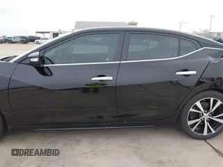 2017 Nissan Maxima SV z VIN 1N4AA6AP0HC450683, wystawiony jako IAAI lot #42101171 z przebiegiem 105 894 mil mil oraz . Historia ofert i sprzedaży dostępna na DreamBid. Obrazek 14.