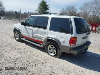 2000 Ford Explorer XLT z VIN 1FMZU83P4YUB84877, wystawiony jako IAAI lot #41719941 z przebiegiem 192 451 mil mil oraz . Historia ofert i sprzedaży dostępna na DreamBid. Obrazek 3.
