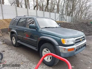 1997 Toyota 4Runner Limited with VIN JT3HN87R1V0078046, listed as a IAAI auction lot 42030550 with 163,683 mi miles. Bid and sale history available at carsss.com. Image 1.