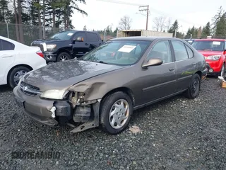 1999 Nissan Altima XE with VIN 1N4DL01D1XC210017, listed as a IAAI auction lot 41199544 with 297,917 mi miles. Bid and sale history available at carsss.com. Image 2.