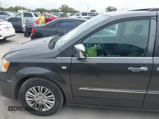 2014 Chrysler Town & Country Touring L with VIN 2C4RC1CG7ER300693, listed as a IAAI auction lot 41849463 with 174,203 mi miles and . Bid and sale history available at carsss.com. Image 19.