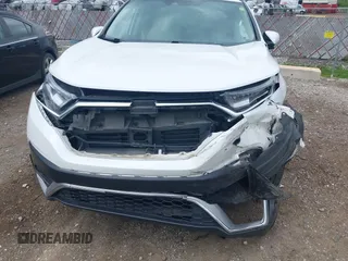 2021 Honda CR-V Touring with VIN 5J6RW2H93ML012016, listed as a IAAI auction lot 42365715 with 55,114 mi miles and . Bid and sale history available at DreamBid. Image 6.