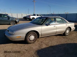 1996 Oldsmobile 88 1SA with VIN 1G3HN52K5T4821446, listed as a Copart auction lot 79962814 with 118,543 mi miles and Salvage Title. Bid and sale history available at DreamBid. Image 1.