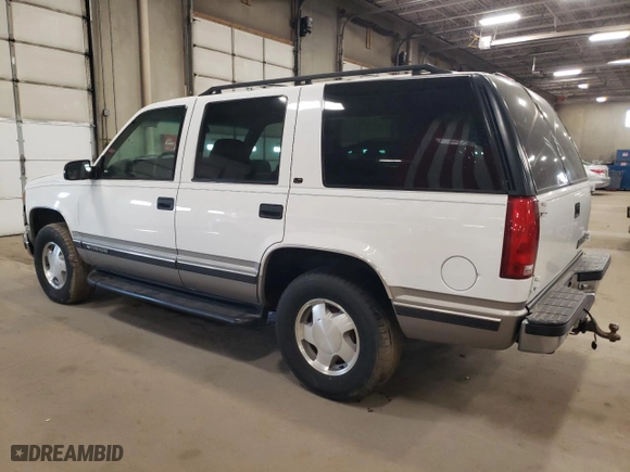1999 Chevrolet Tahoe Z71 with VIN 1GNEK13R8XJ476282, listed as a Copart auction lot 48573705 with 207,260 mi miles and Salvage Title. Bid and sale history available at carsss.com. Image 2.