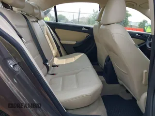 2014 Volkswagen Jetta SE with VIN 3VWD07AJ7EM251973, listed as a IAAI auction lot 42415573 with 124,323 mi miles and . Bid and sale history available at DreamBid. Image 8.