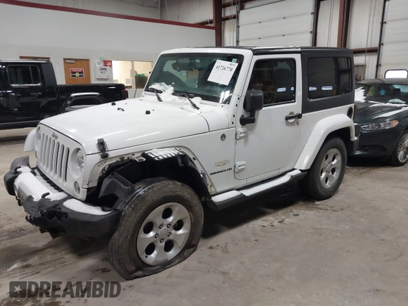 2014 Jeep Wrangler Sahara with VIN 1C4AJWBG7EL234625, listed as a IAAI auction lot 41726770 with 128,080 mi miles and . Bid and sale history available at DreamBid. Image 2.