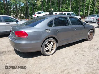 2014 Volkswagen Passat S with VIN 1VWAP7A37EC018693, listed as a IAAI auction lot 42463719 with 143,105 mi miles and . Bid and sale history available at DreamBid. Image 4.