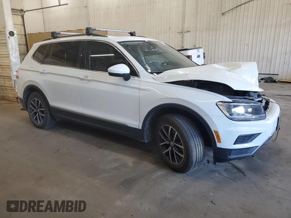 2020 Volkswagen Tiguan SE with VIN 3VV2B7AXXLM058031, listed as a Copart auction lot 76522644 with 34,361 mi miles and Salvage Title. Bid and sale history available at DreamBid. Image 4.