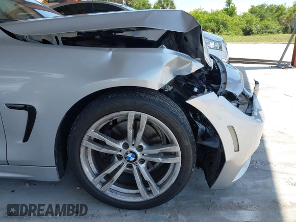 2015 BMW 4 Series 428i with VIN WBA4A5C58FD410076, listed as a IAAI auction lot 39384271 with 125,987 mi miles and . Bid and sale history available at DreamBid. Image 13.