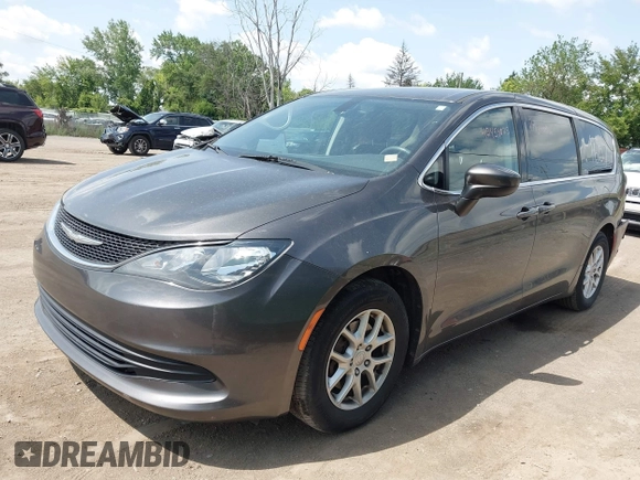 2017 Chrysler Pacifica Touring with VIN 2C4RC1DG1HR571607, listed as a IAAI auction lot 42454025 with 130,601 mi miles and . Bid and sale history available at DreamBid. Image 2.